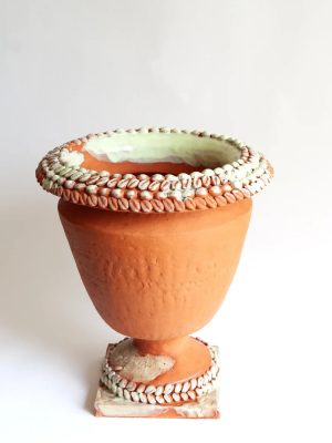 Terracotta cowrie urn